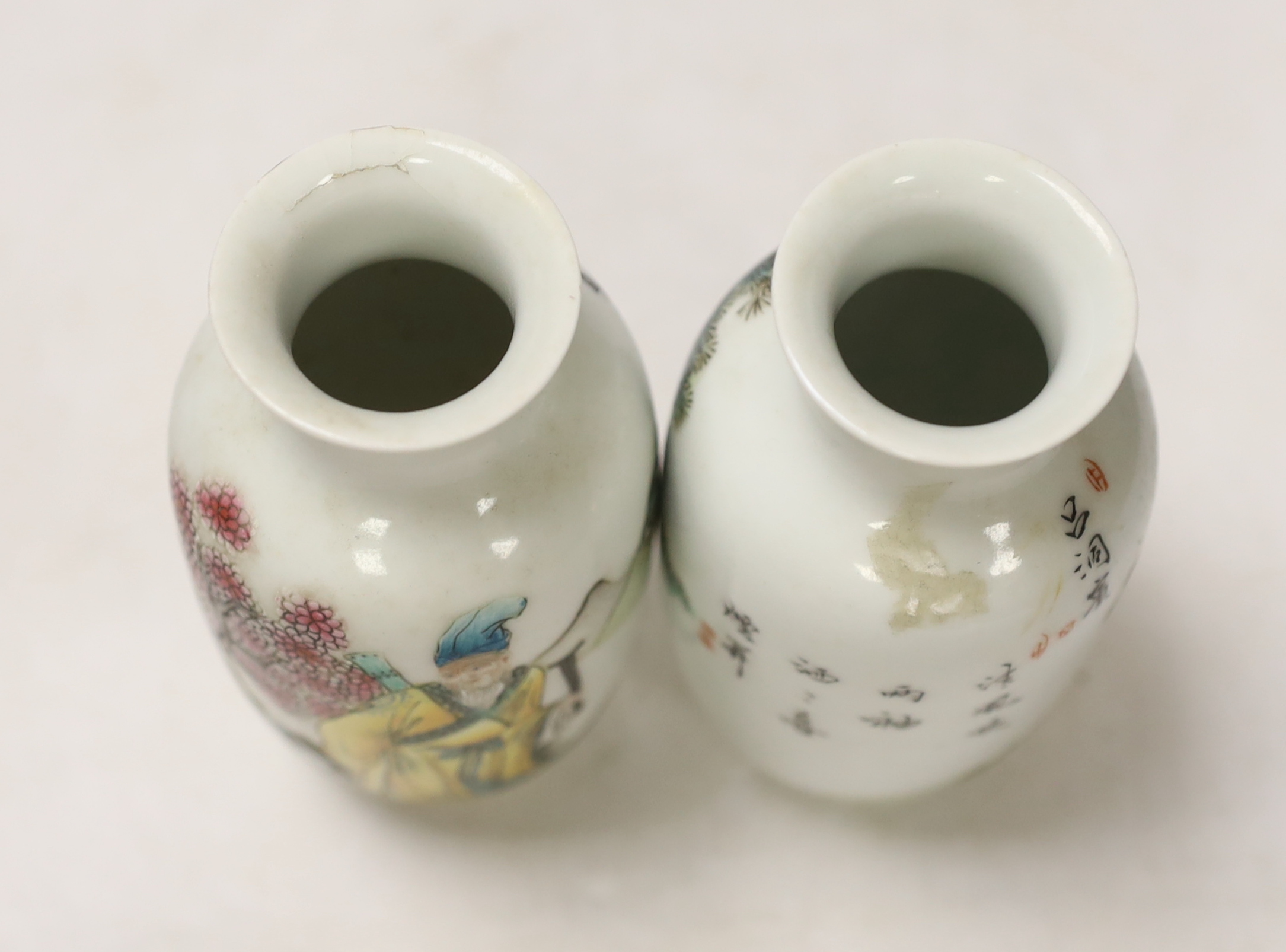 A pair of small Chinese famille verte vases, Qianlong marks but Republic period, depicting Lu Dongbin and Li Tieguai, 13cm